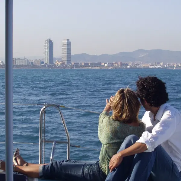 Couple enjoying a tour on Catamaran Orsom Barcelona
